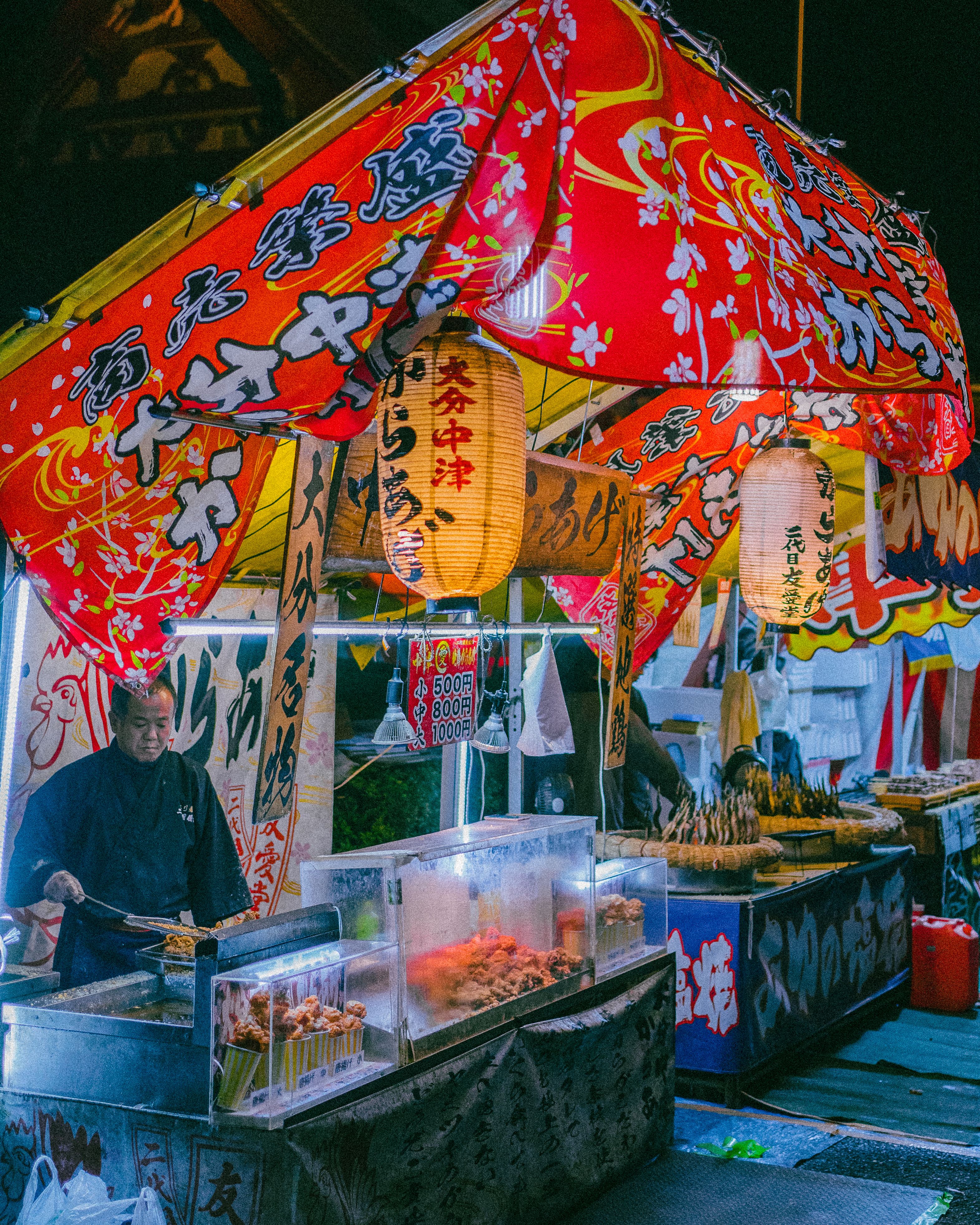 Traveler enjoying street food in Japan