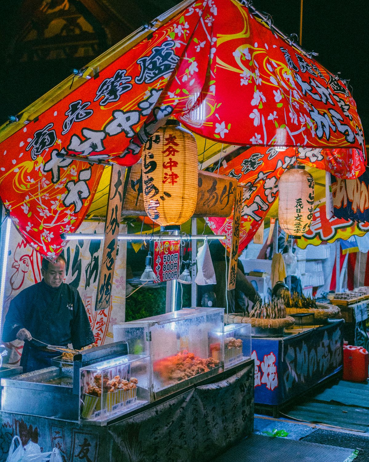 Colorful street food and drink stall at a market