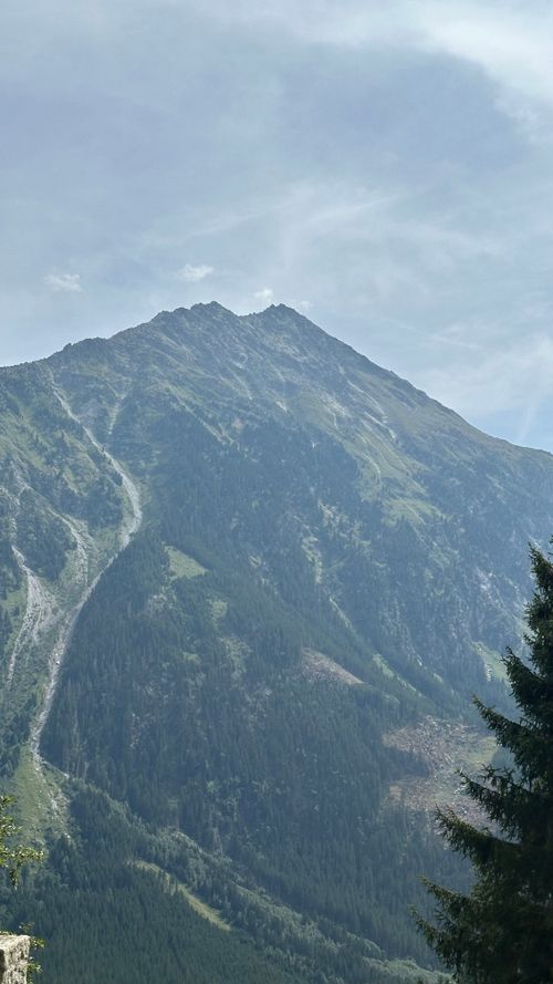 Free Panoramic view of a majestic alpine mountain in Austria during summer. Stock Photo