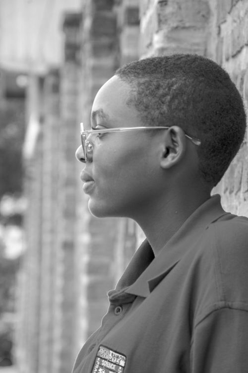 Free Black and white side profile portrait of a woman in urban Rwanda. Stock Photo