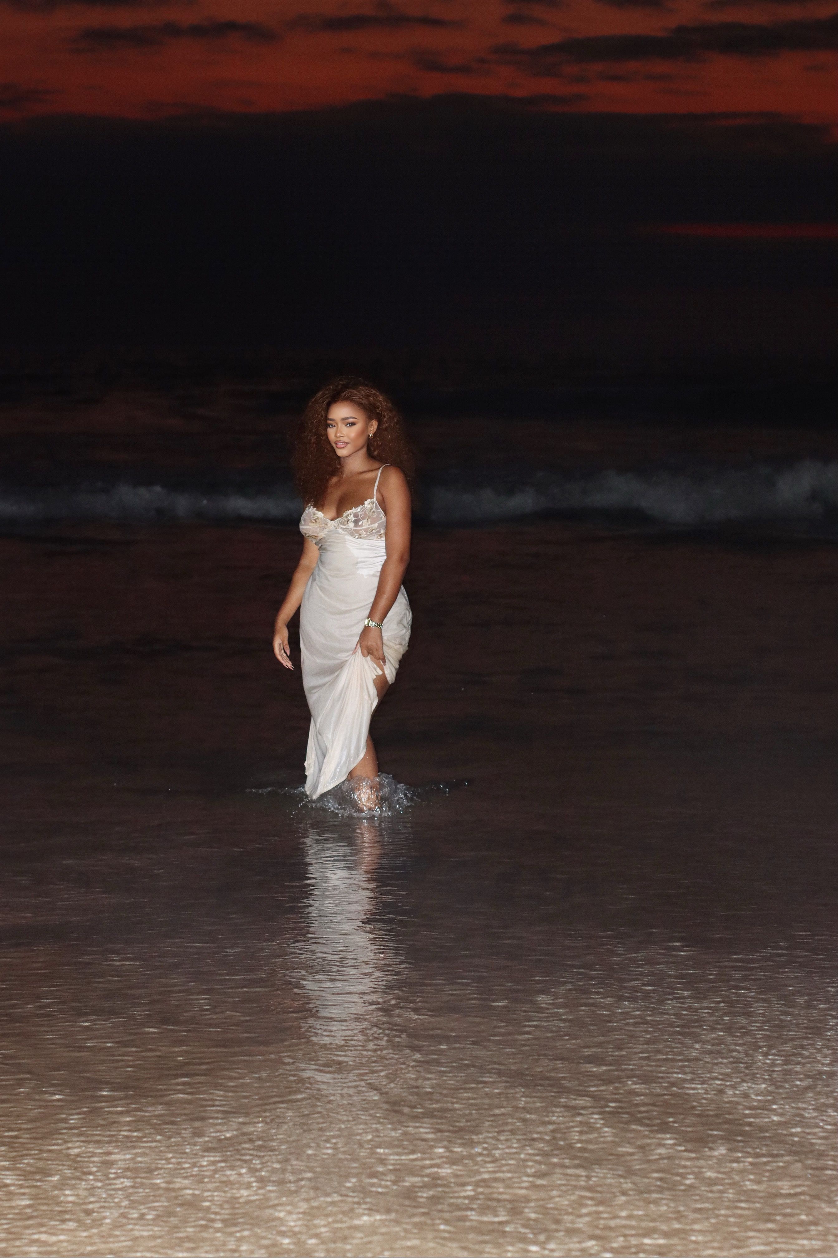 Elegant Woman in White Dress at Night Beach  Free Stock Photo