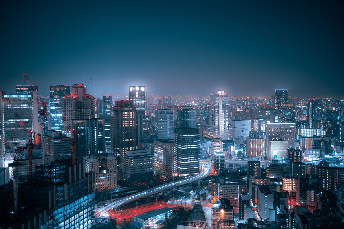 Osaka city lights and skyscrapers illuminated at night