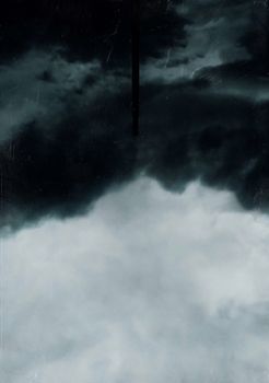 Abstract gloomy background of gray dense cloud and heavy black night sky above