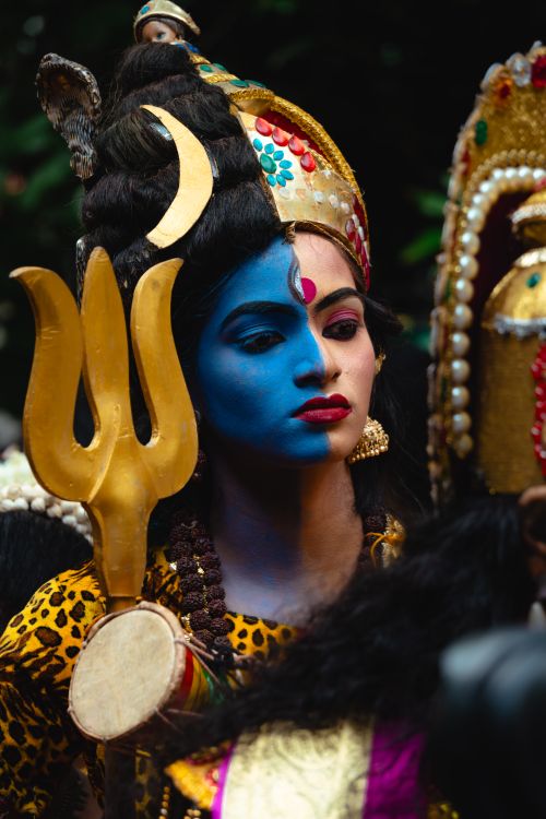 Free A striking portrait of a person in traditional Indian attire and makeup. Stock Photo