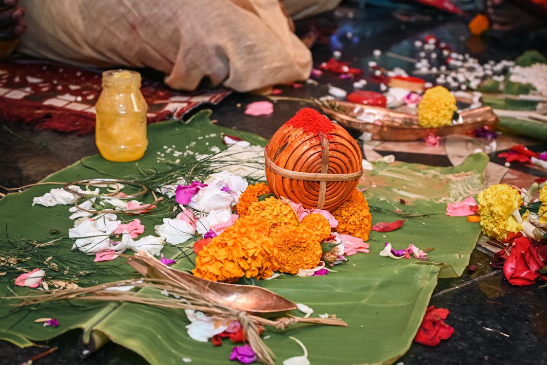 Traditional Indian Ritual Setup with Flowers · Free Stock Photo