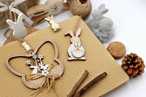 Free Natural wooden Easter bunny decorations with recycled materials and rustic charm. Stock Photo