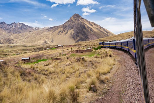 Experience a breathtaking train journey through the picturesque landscape of the Andes in Peru.
