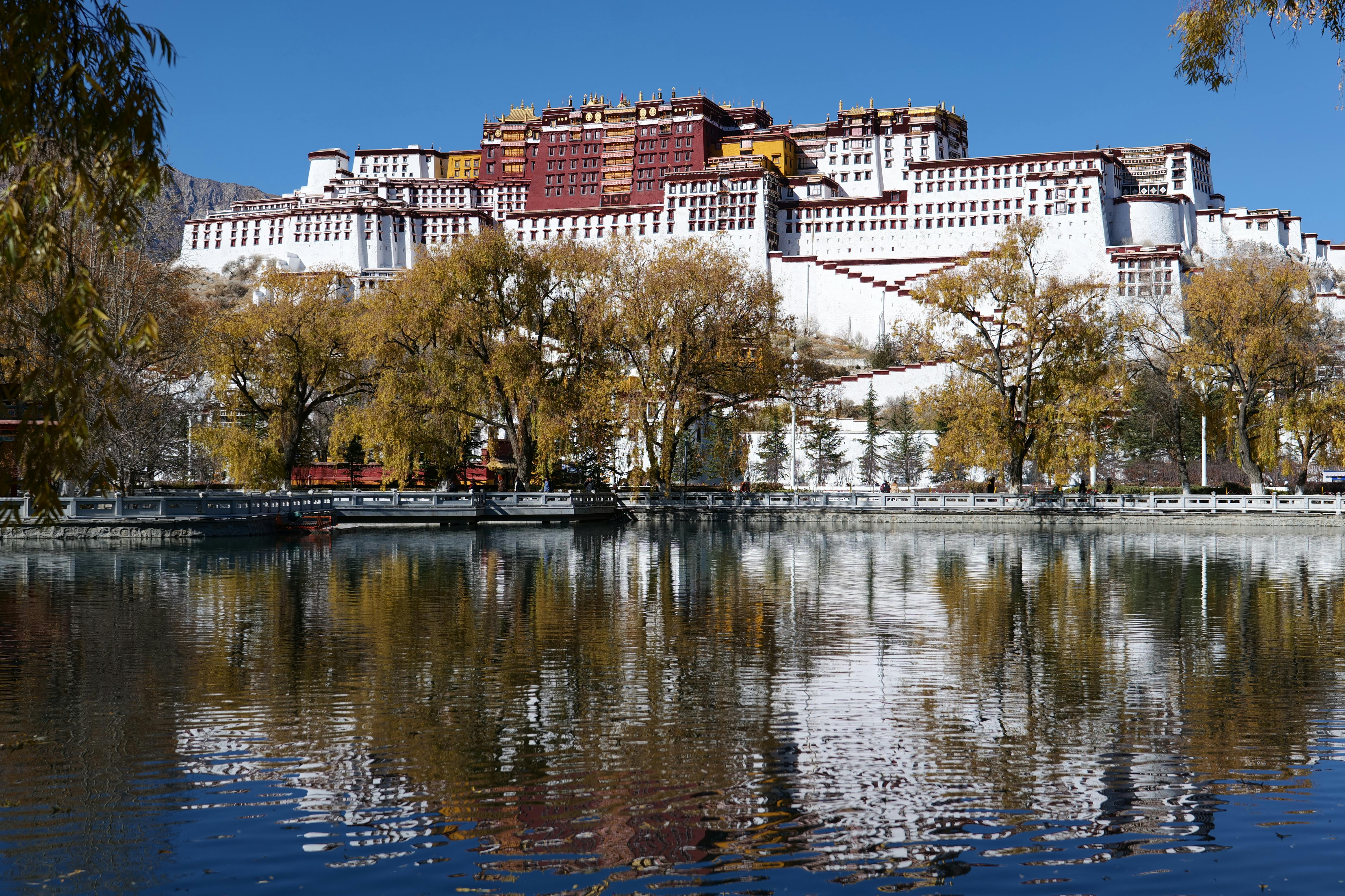 iconic potala palace reflected in water