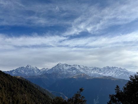 Majestic view of the snow-capped Himalayan peaks in Chamoli, Uttarakhand.
