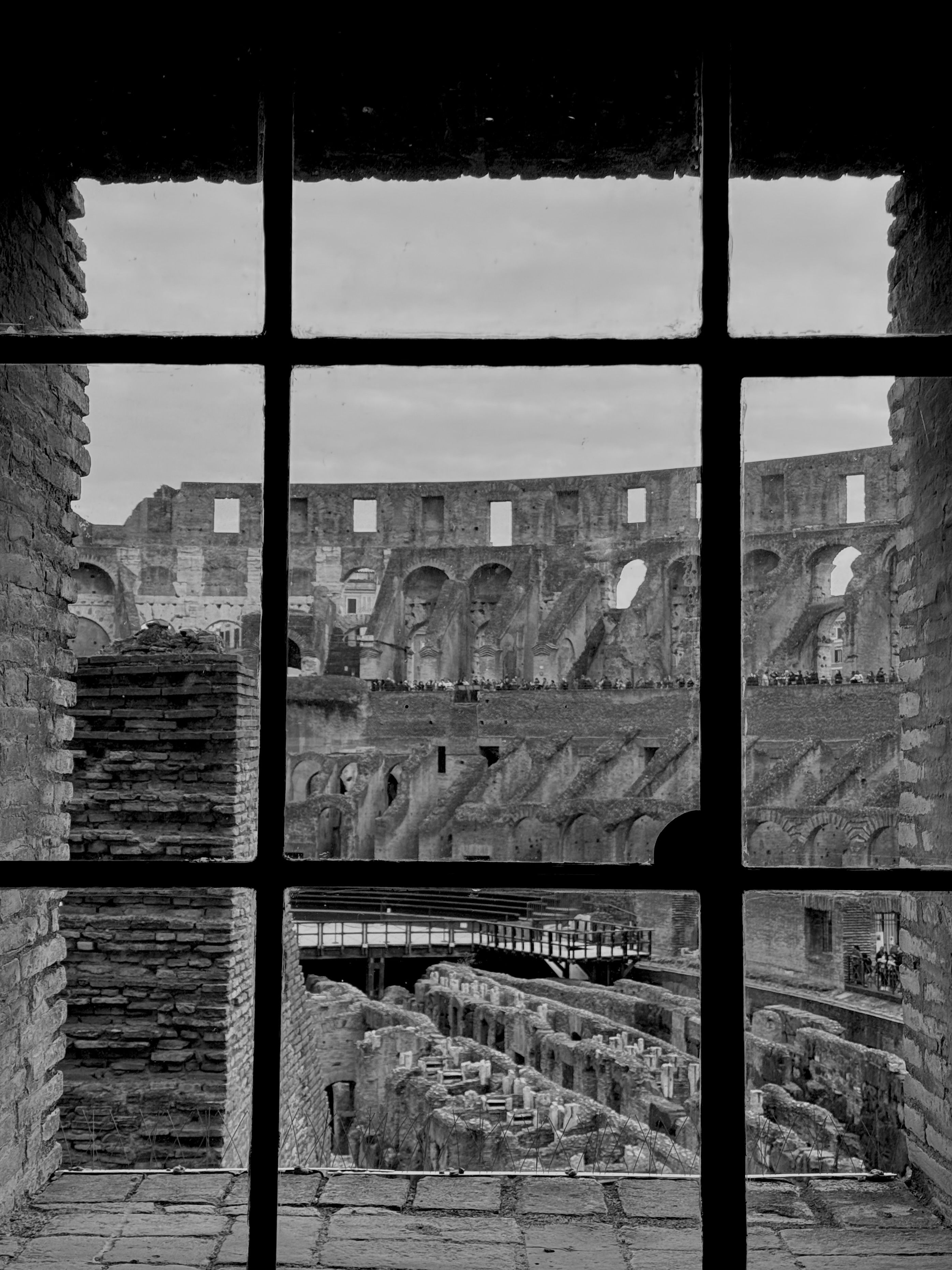 Colosseum Viewed Through Window Frame · Free Stock Photo