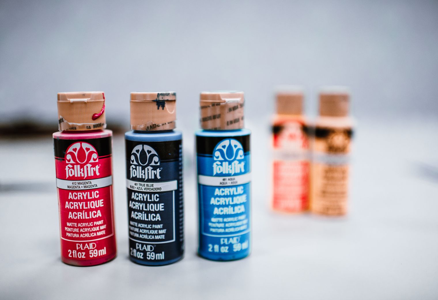 Masonry and Render Painting in The Hale — quality trade paint going on in two coats