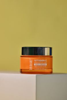 Brightening anti-aging day cream with Vitamin C for even skin tone.