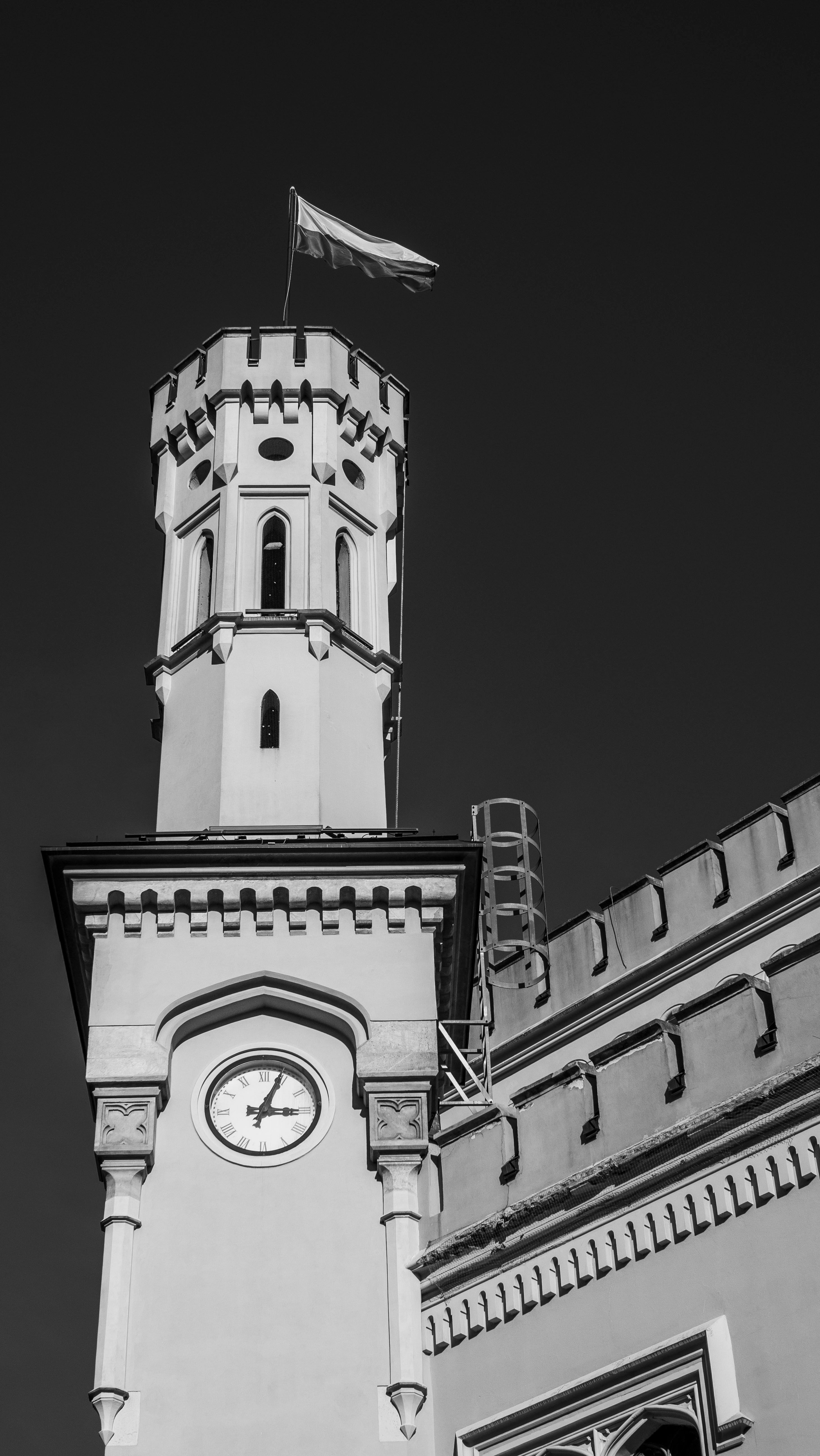 Gothic Clock Tower Against Clear Sky · Free Stock Photo