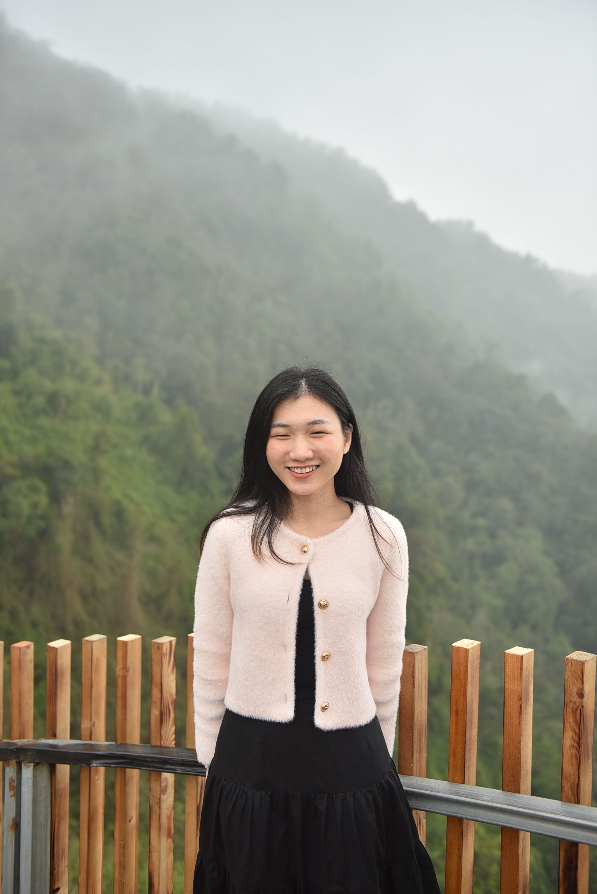 Smiling Woman Posing Outdoors in Nature · Free Stock Photo