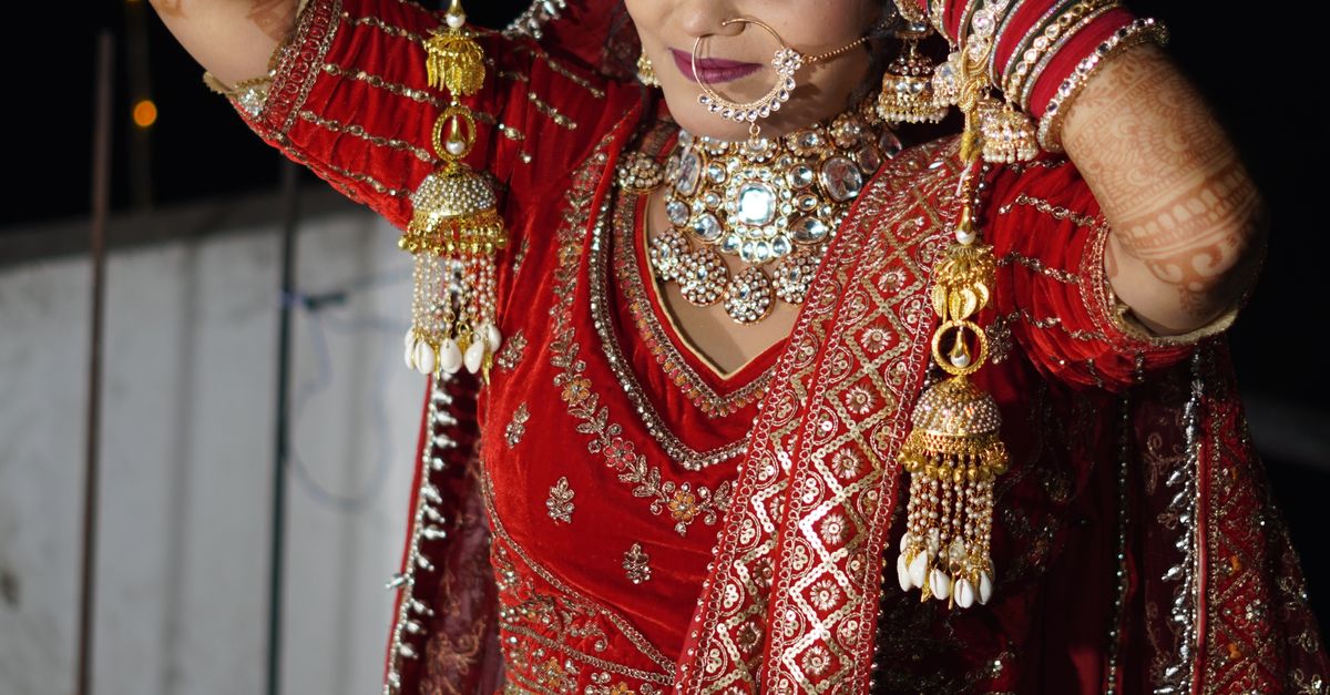 Indian Bride In Traditional Red Bridal Attire Free Stock Photo indian-bride-in-traditional-red-bridal-attire-free-stock-photo