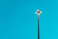 Minimalist Streetlight Against Clear Blue Sky