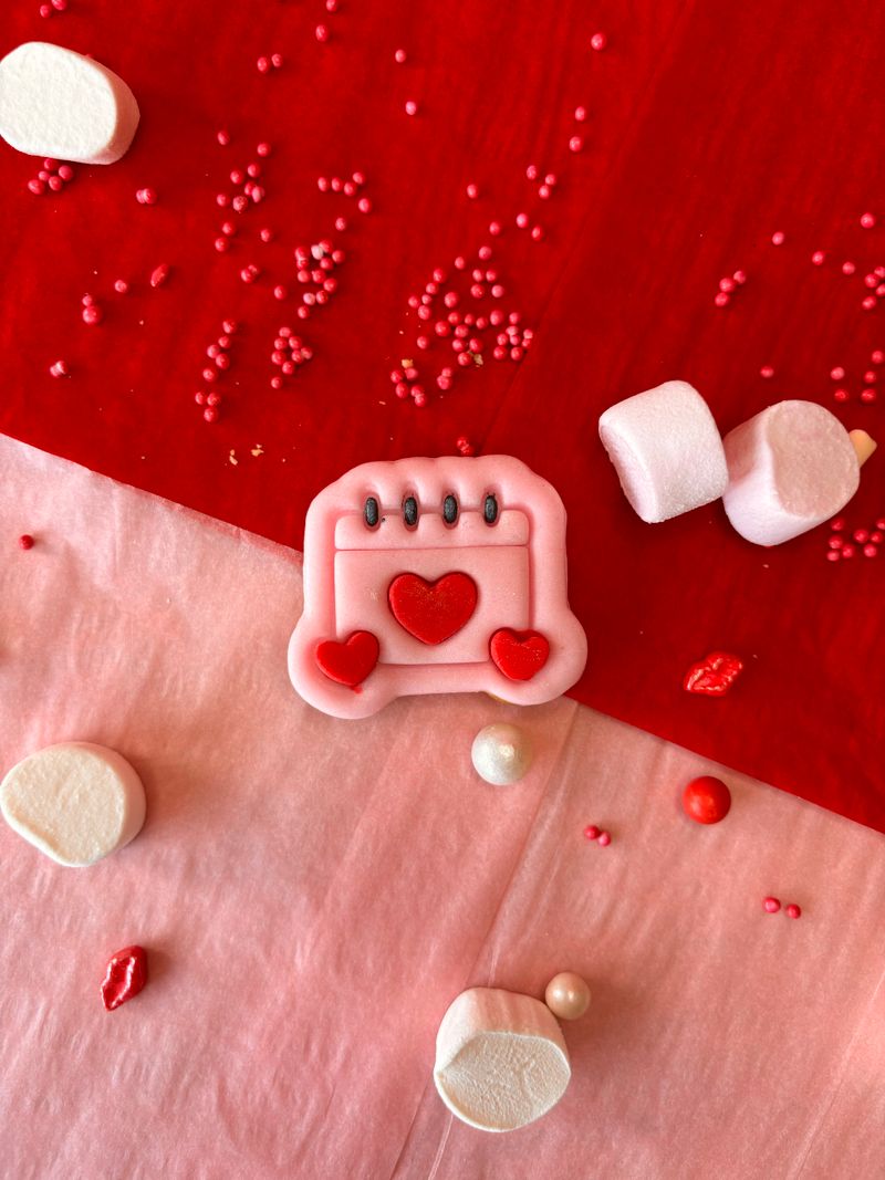 Valentine's Day heart decorations on a pink background