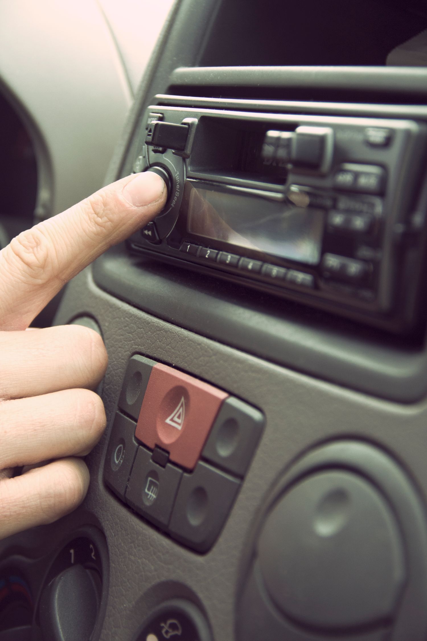 Person Touching 1-din Head Unit Button · Free Stock Photo