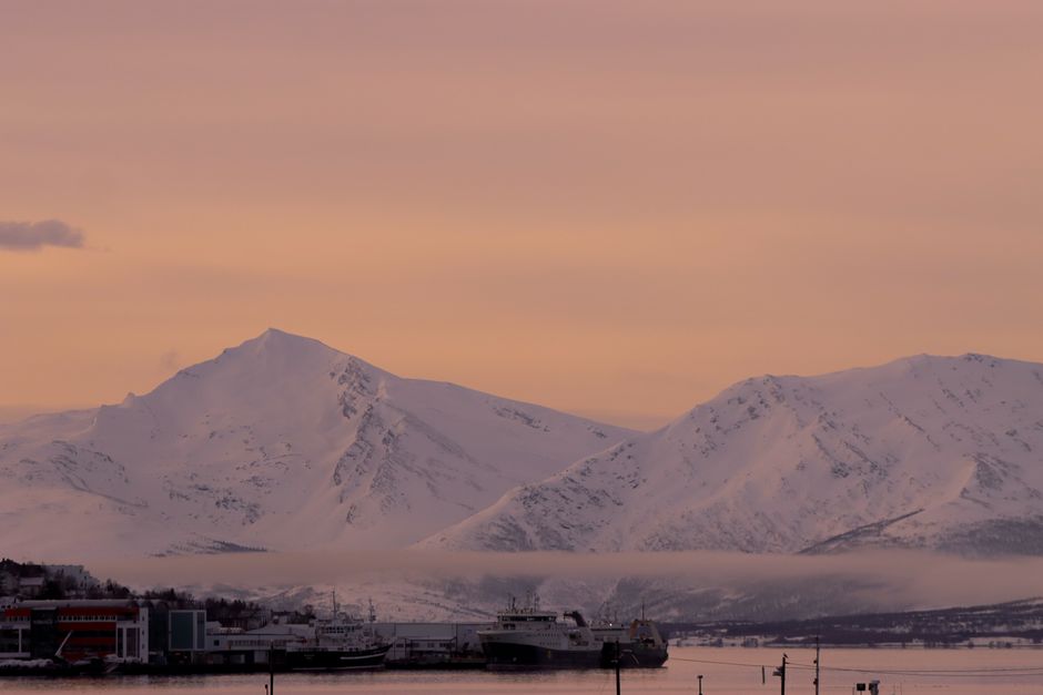 Snow-covered fjord landscape in Norway during winter
