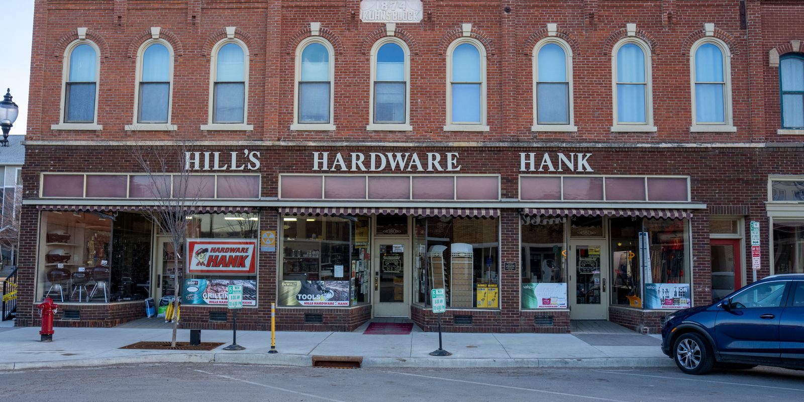 A charming brick storefront facade in a historic downtown
