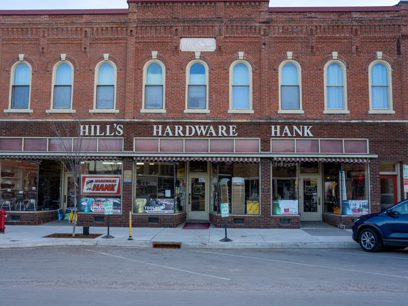 A historic brick storefront on a small-town main street