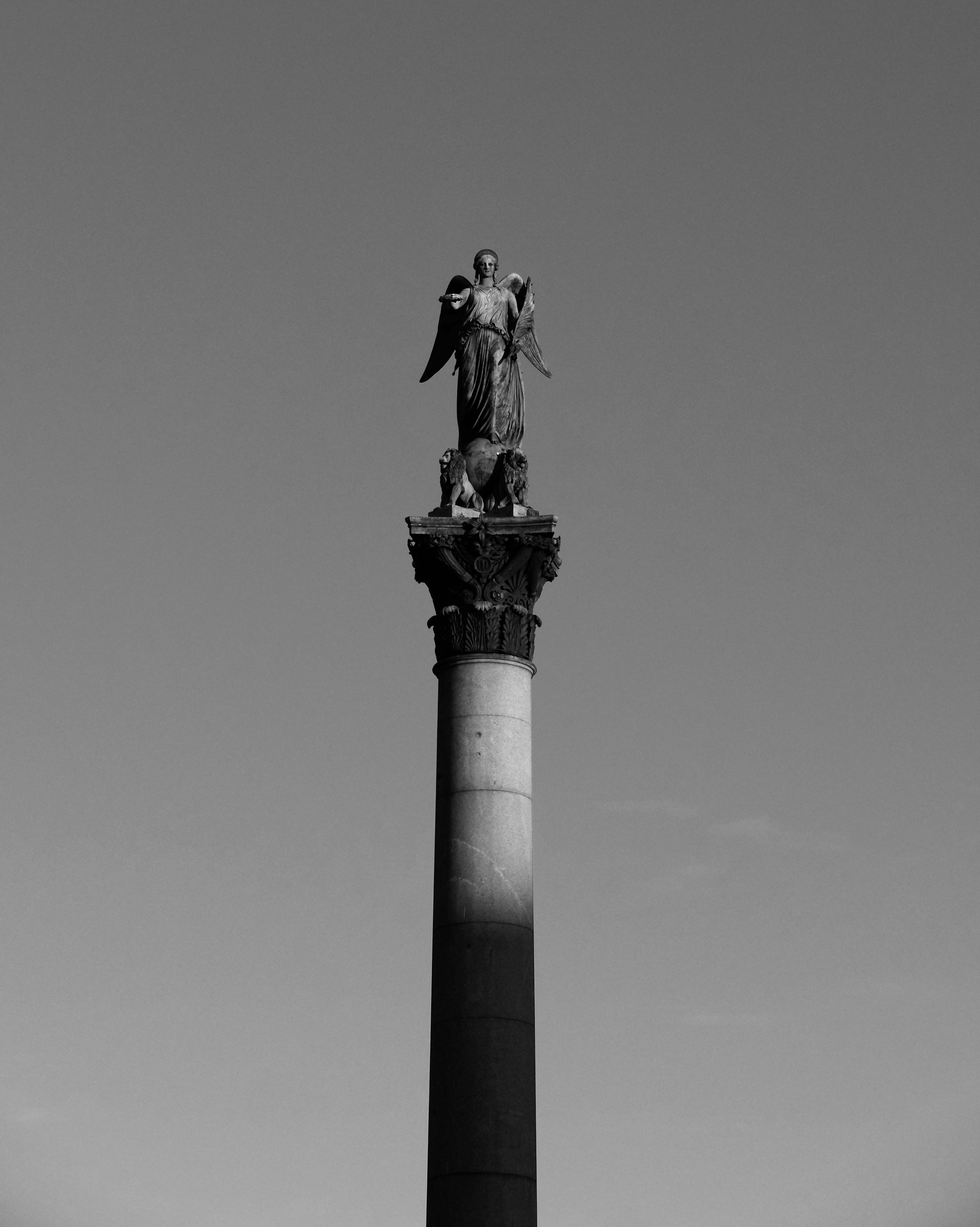 Black and White Photograph of Tall Column with Angel Statue · Free ...