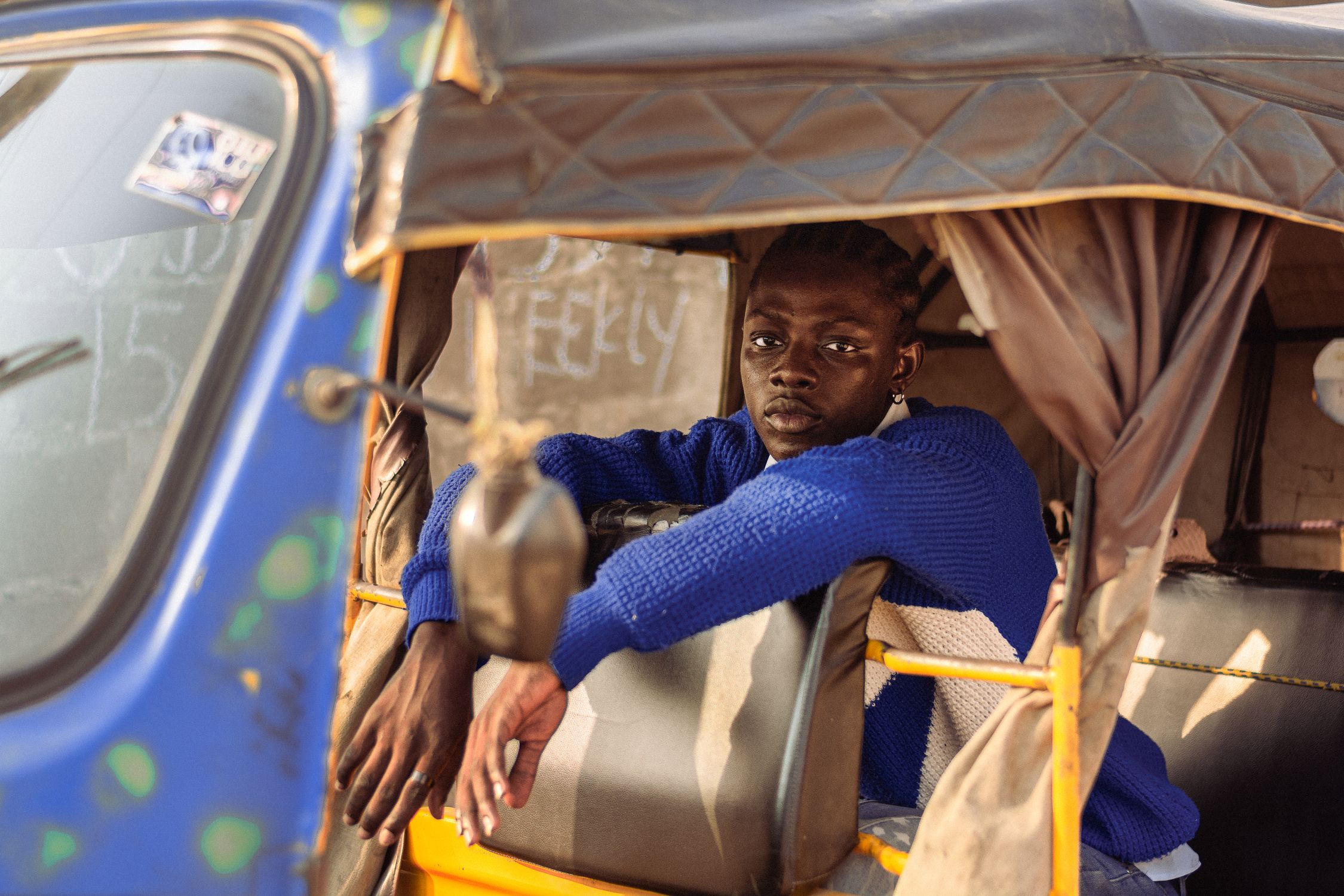 Youthful Expression Inside A Lagos Keke Free Stock Photo Youthful Expression Inside A Lagos Keke Free Stock Photo