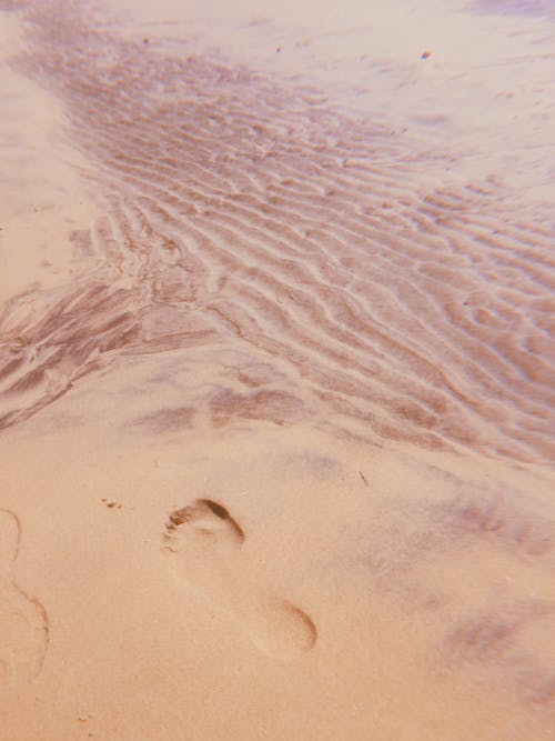 Ingyenes stockfotó homok, lábnyom, part témában Stockfotó