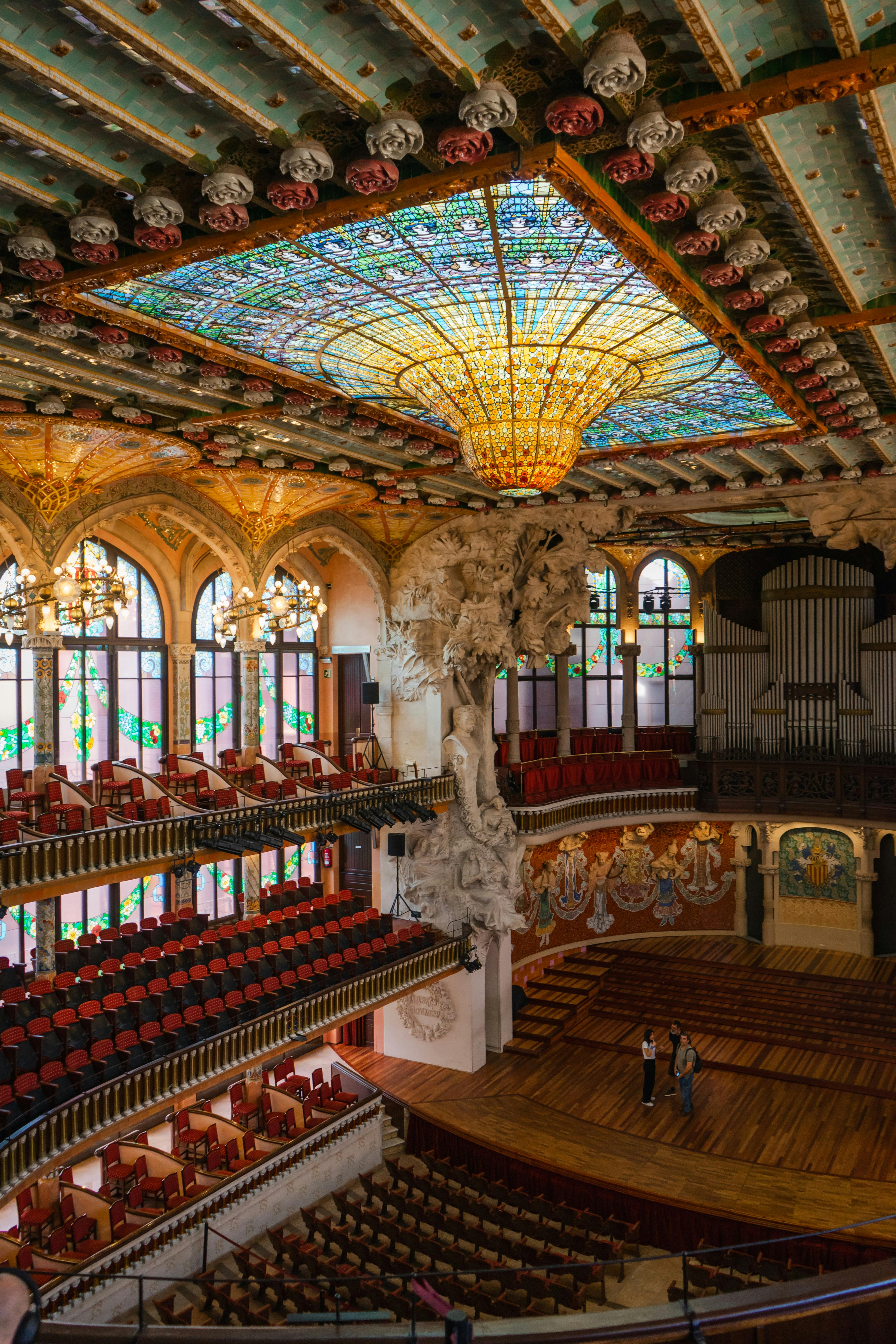 Free Explore the stunning interior of Palau de la Música Catalana with its intricate architecture and stained glass. Stock Photo