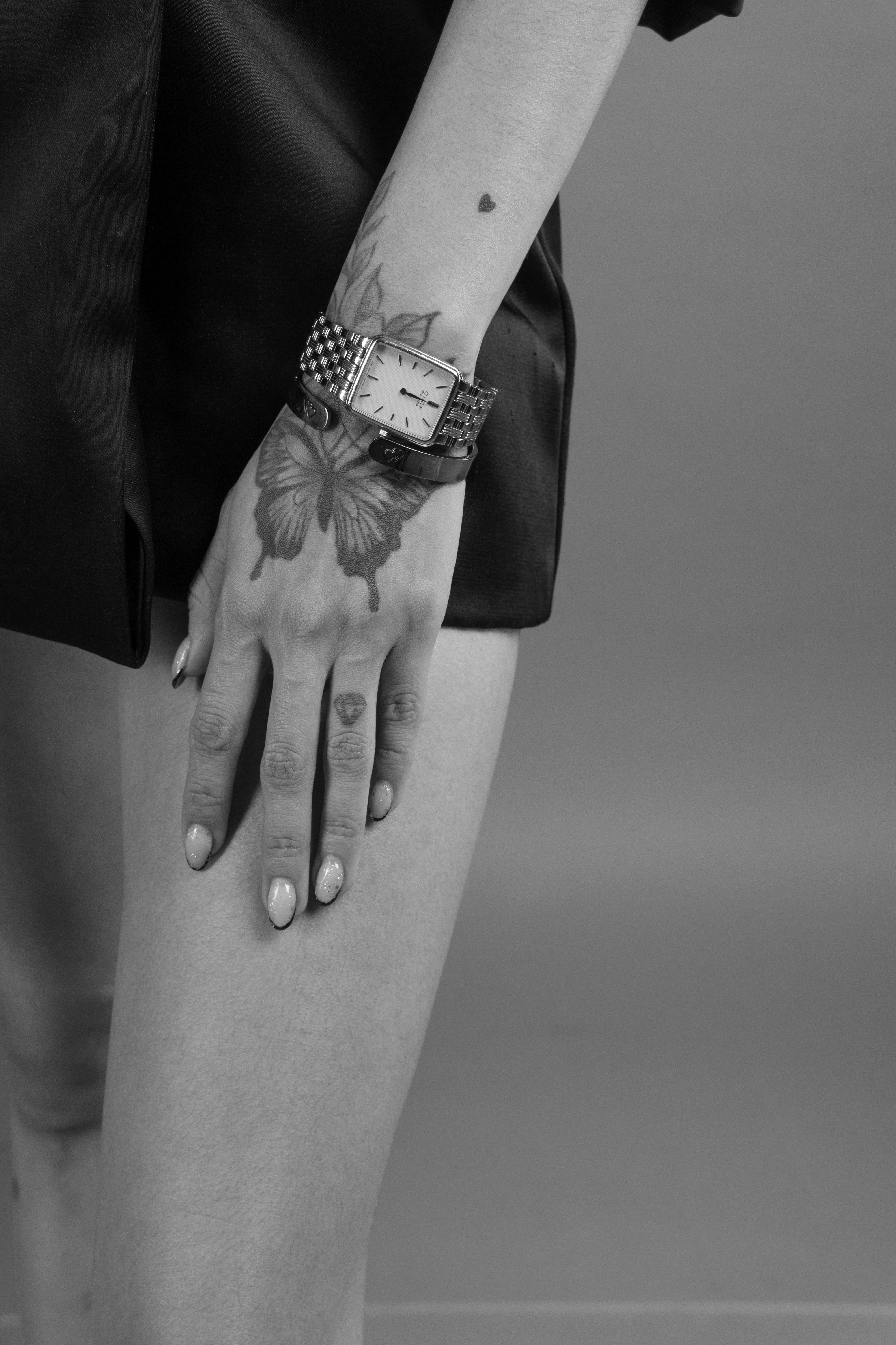 Elegant Tattoo Art on Female Hand in Black and White · Free Stock Photo