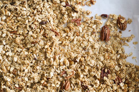 Delicious homemade granola with oats and pecans, perfect for a healthy breakfast.