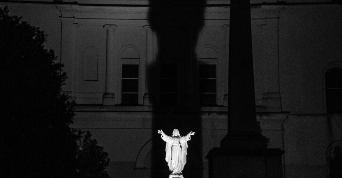 Christ Shadow Dramatic Night Shadow of Christ Statue · Free Stock Photo