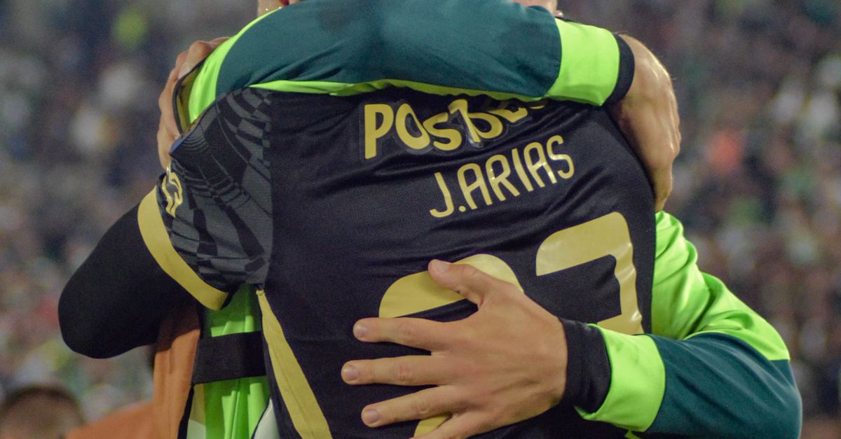 Soccer Players Hugging in Celebration during Match · Free Stock Photo
