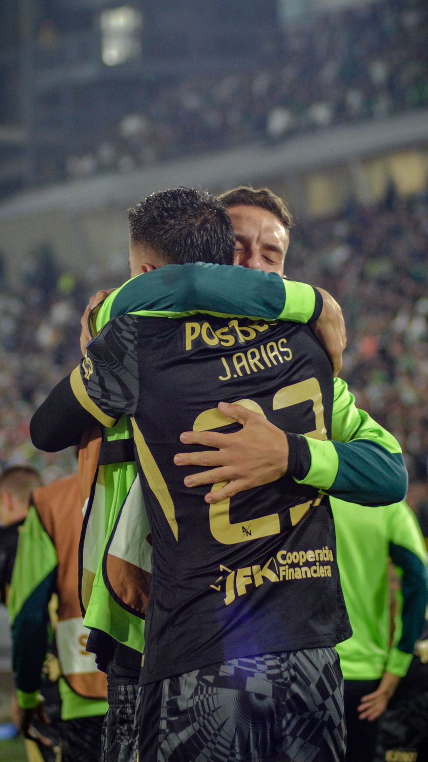 Soccer Players Hugging in Celebration during Match · Free Stock Photo