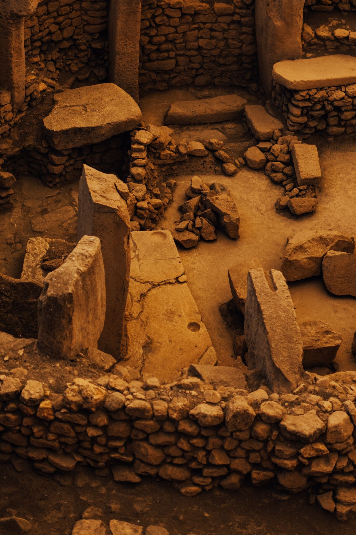 Ancient stone ruins in archaeological landscape