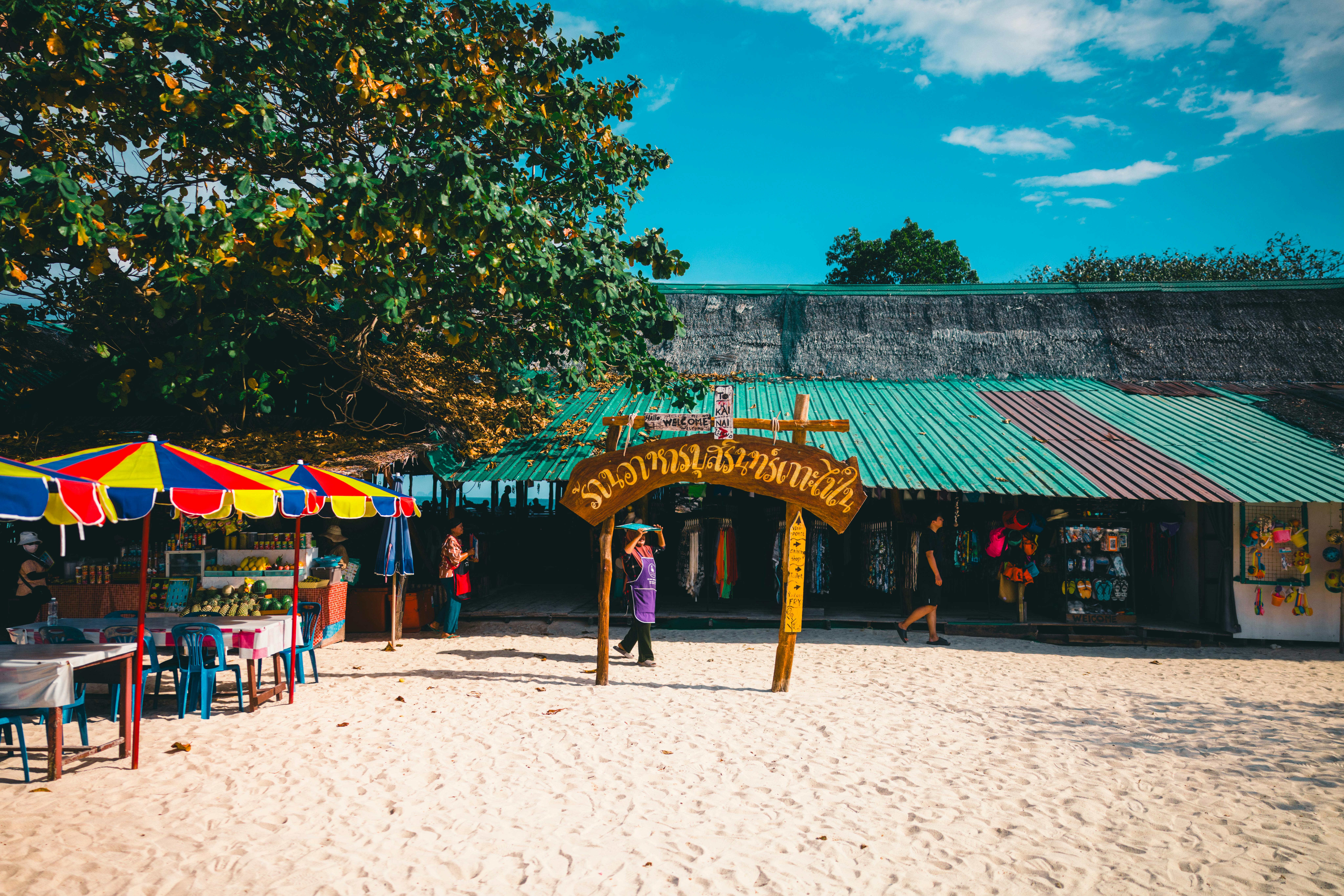 Colorful umbrellas on a sunny Phuket beach Thailand