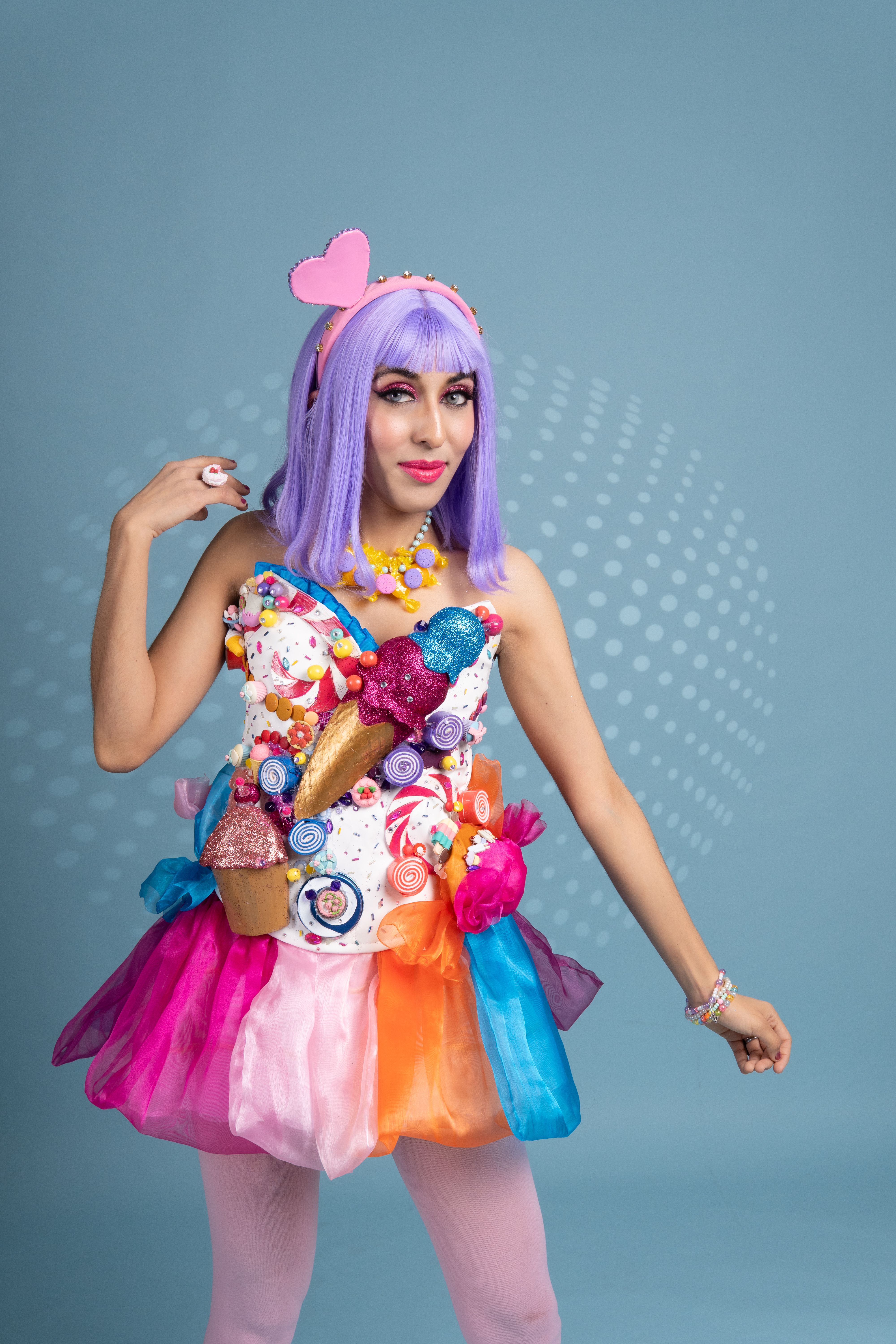 Colorful Cosplay with Purple Wig and Vibrant Dress · Free Stock Photo