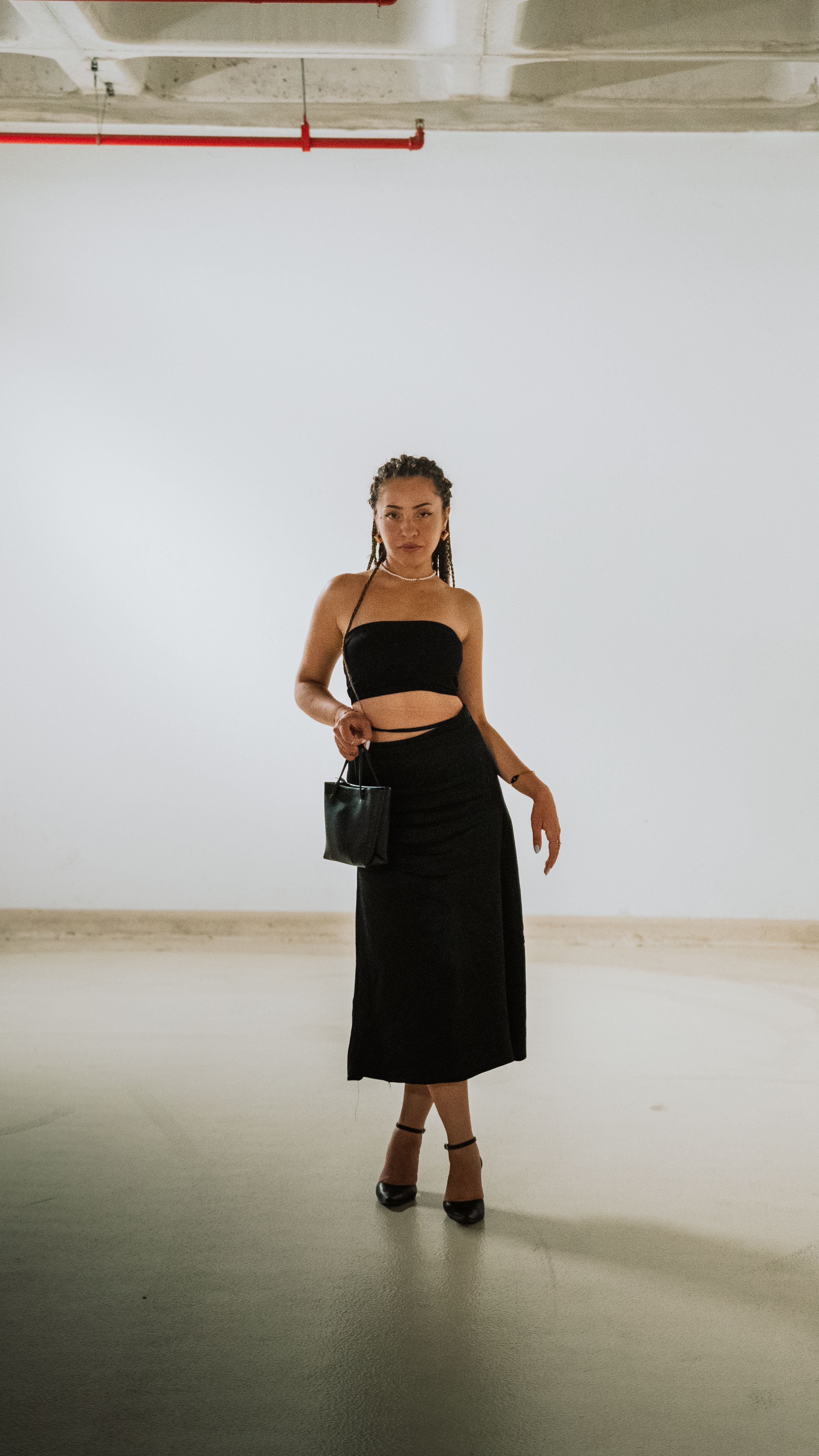 Elegant Woman in Black Dress Indoors · Free Stock Photo