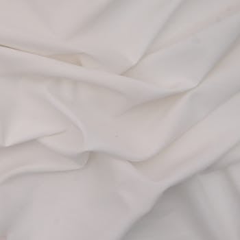 High-resolution image of a white fabric showcasing elegant draping and soft folds.
