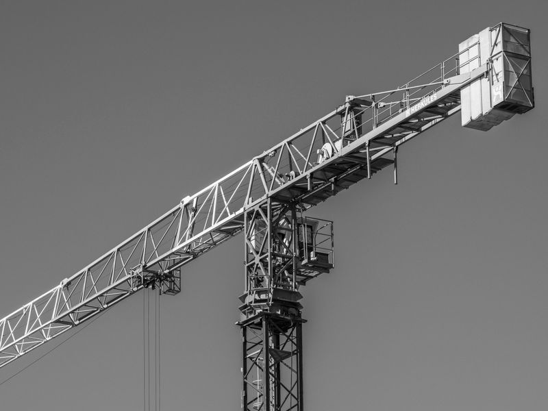 Crane on a Construction in Black and White · Free Stock Photo