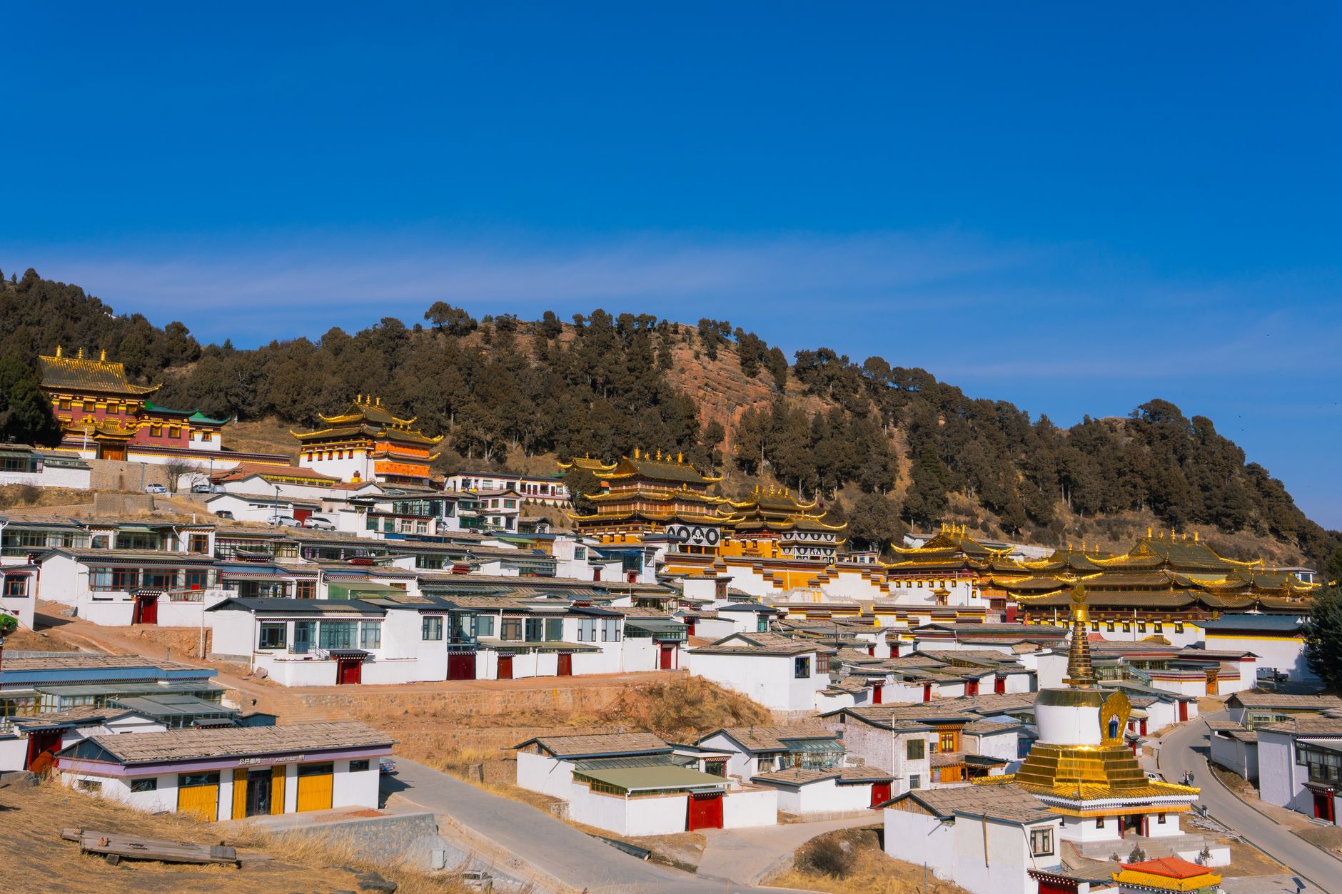 Scenic view of Tibetan monastery in mountain sunlight