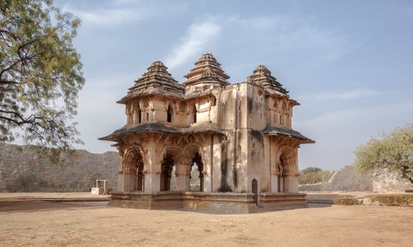 Majestic view of the iconic Lotus Mahal in Hampi, showcasing exquisite Vijayanagara architecture.