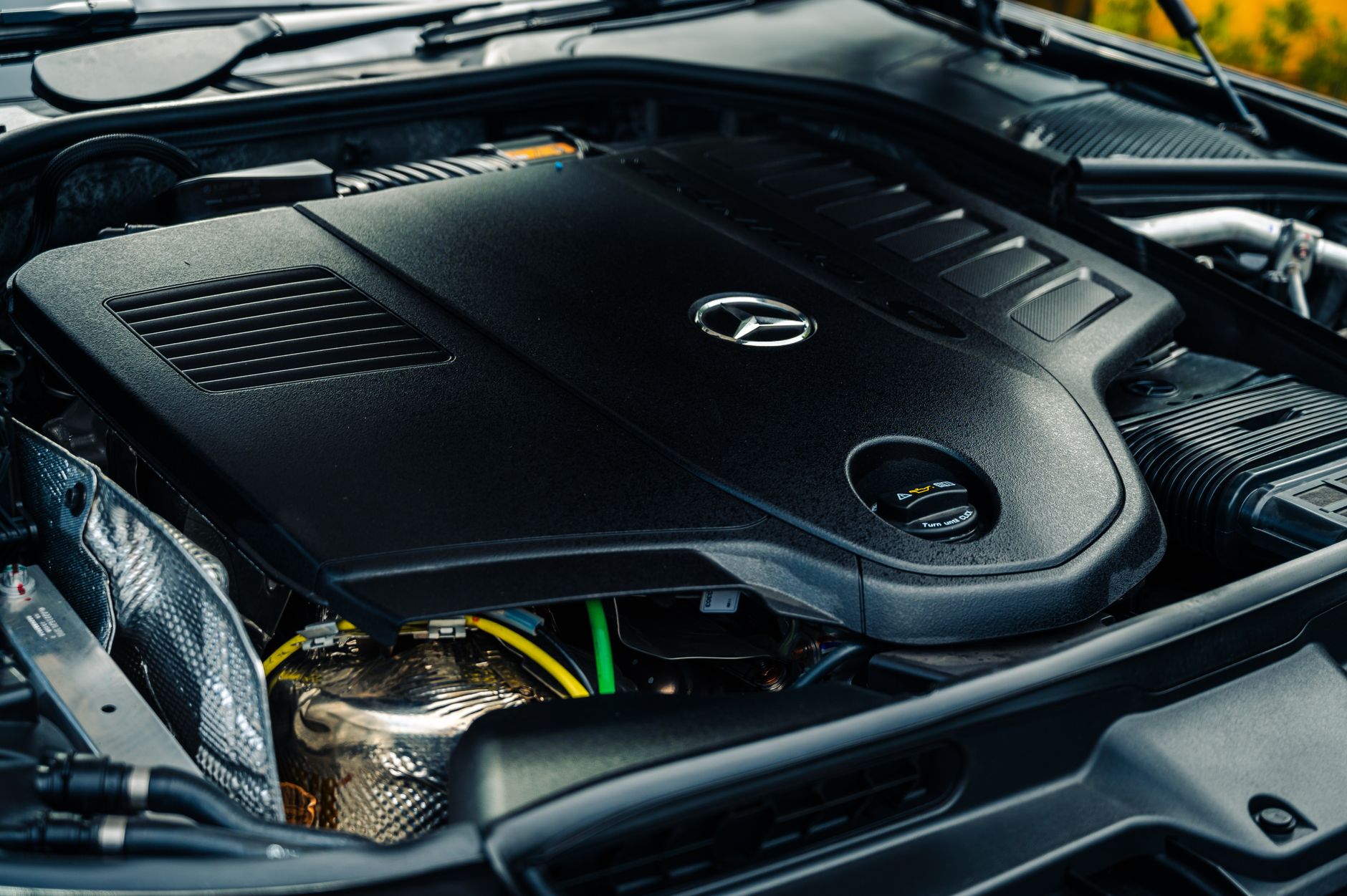Detailed view of a Mercedes-Benz engine showcasing high-performance luxury technology.