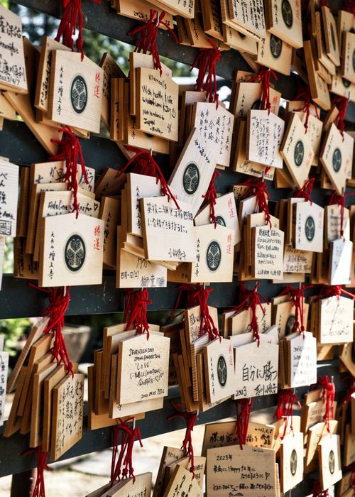 Free Wooden prayer plaques at Zojoji Temple, Tokyo, with handwritten wishes. Stock Photo