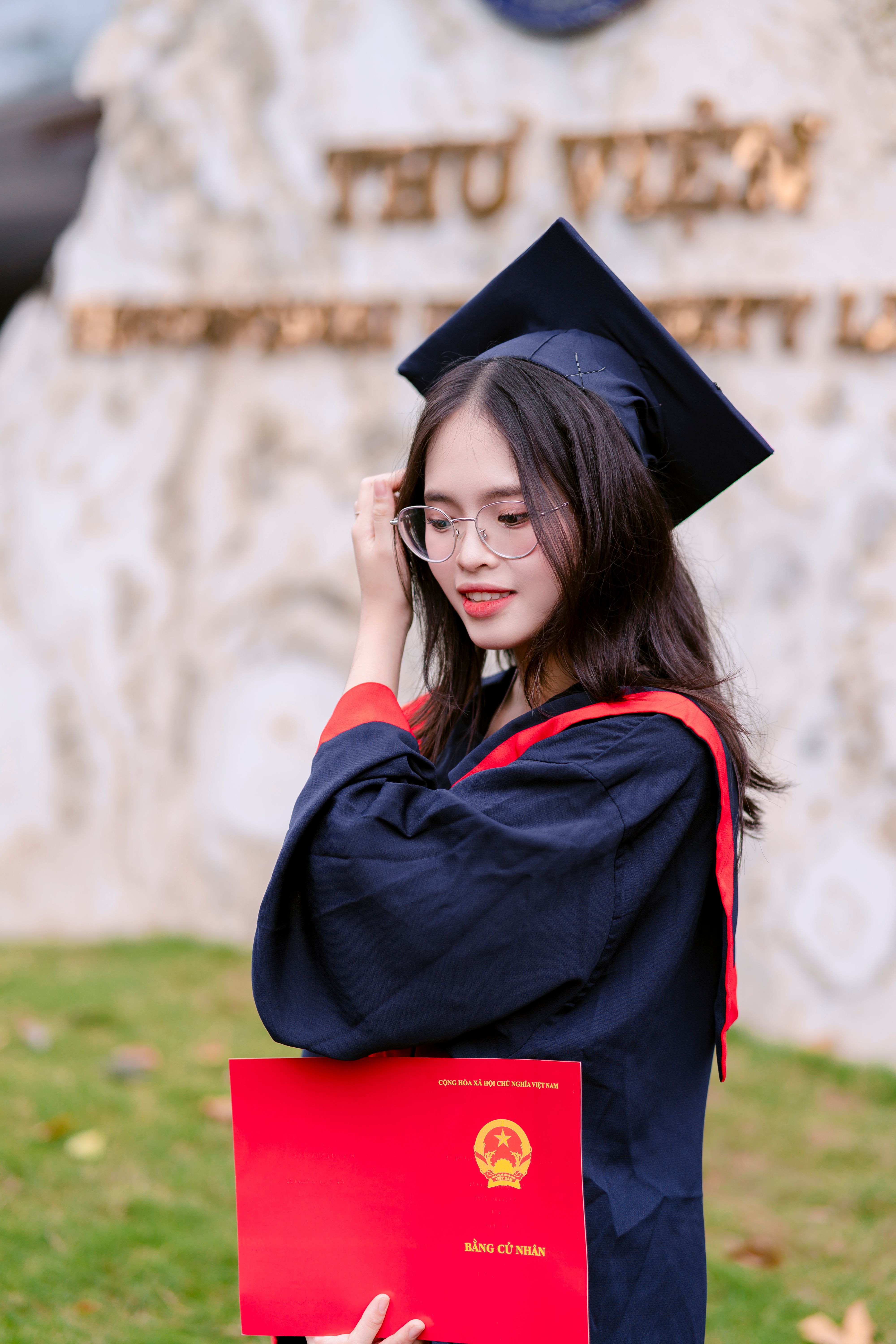 Man Wearing Black Graduation Gown and Cap · Free Stock Photo