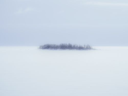 Free A minimalist winter scene of a snowy island in Kemi, Lapland, Finland. Stock Photo