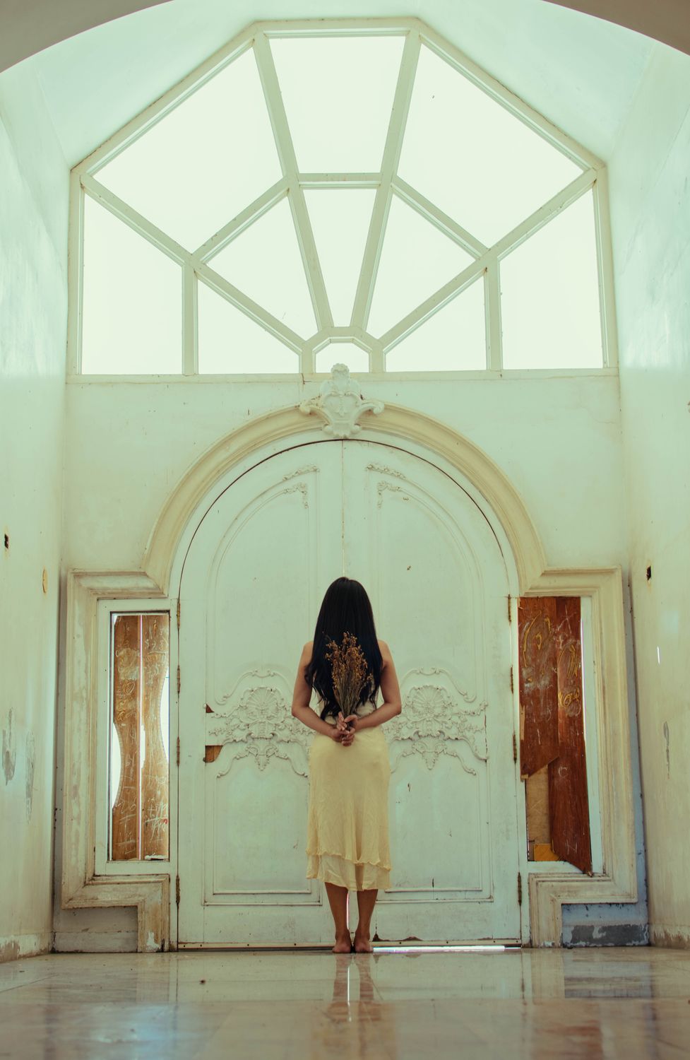 Woman Standing In Front Of A Door Wearing A Veil · Free Stock Photo