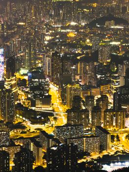 Discover the illuminated skyscrapers and vibrant urban lights of Hong Kong at night.