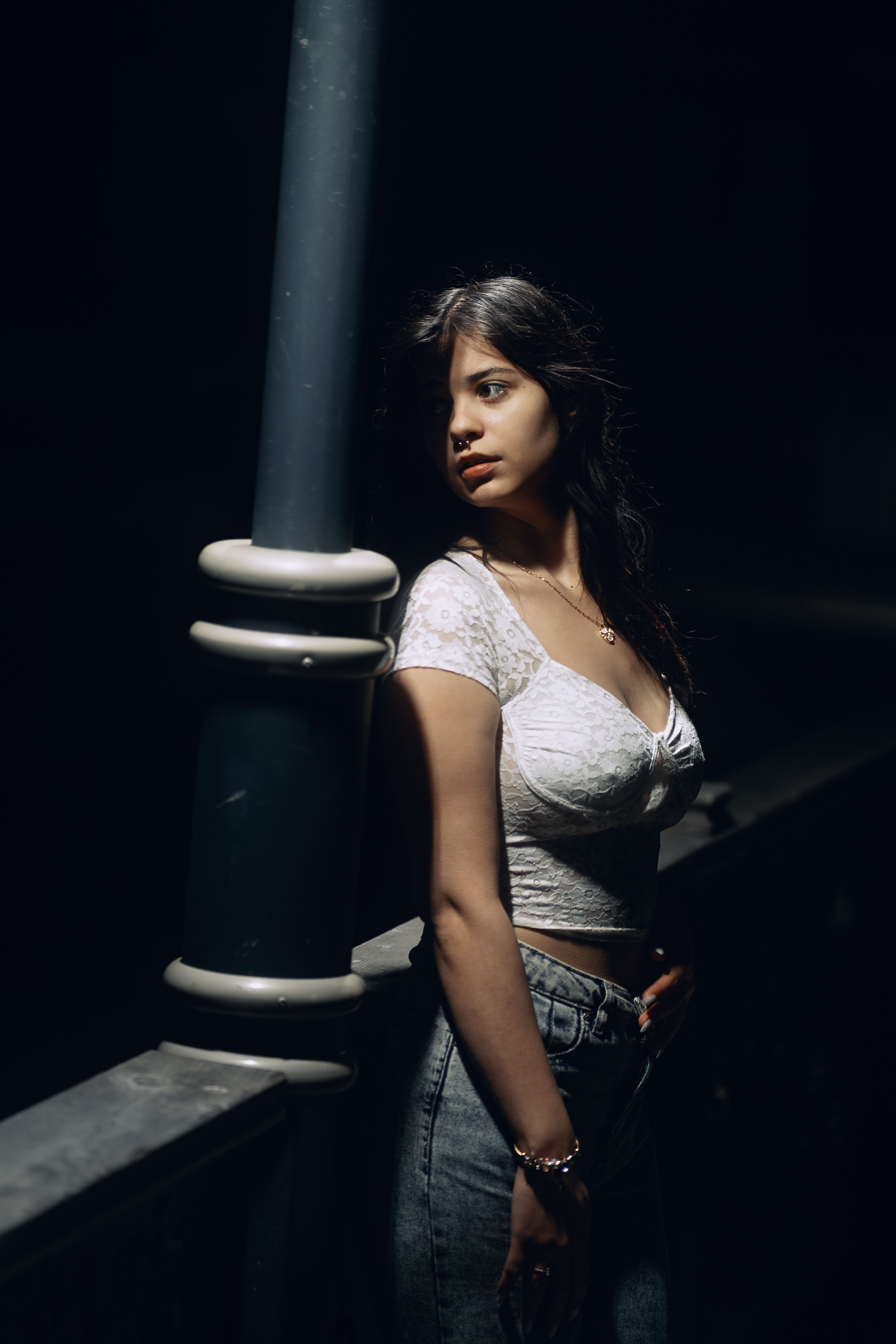 Woman wearing a lace top with jeans for a night out