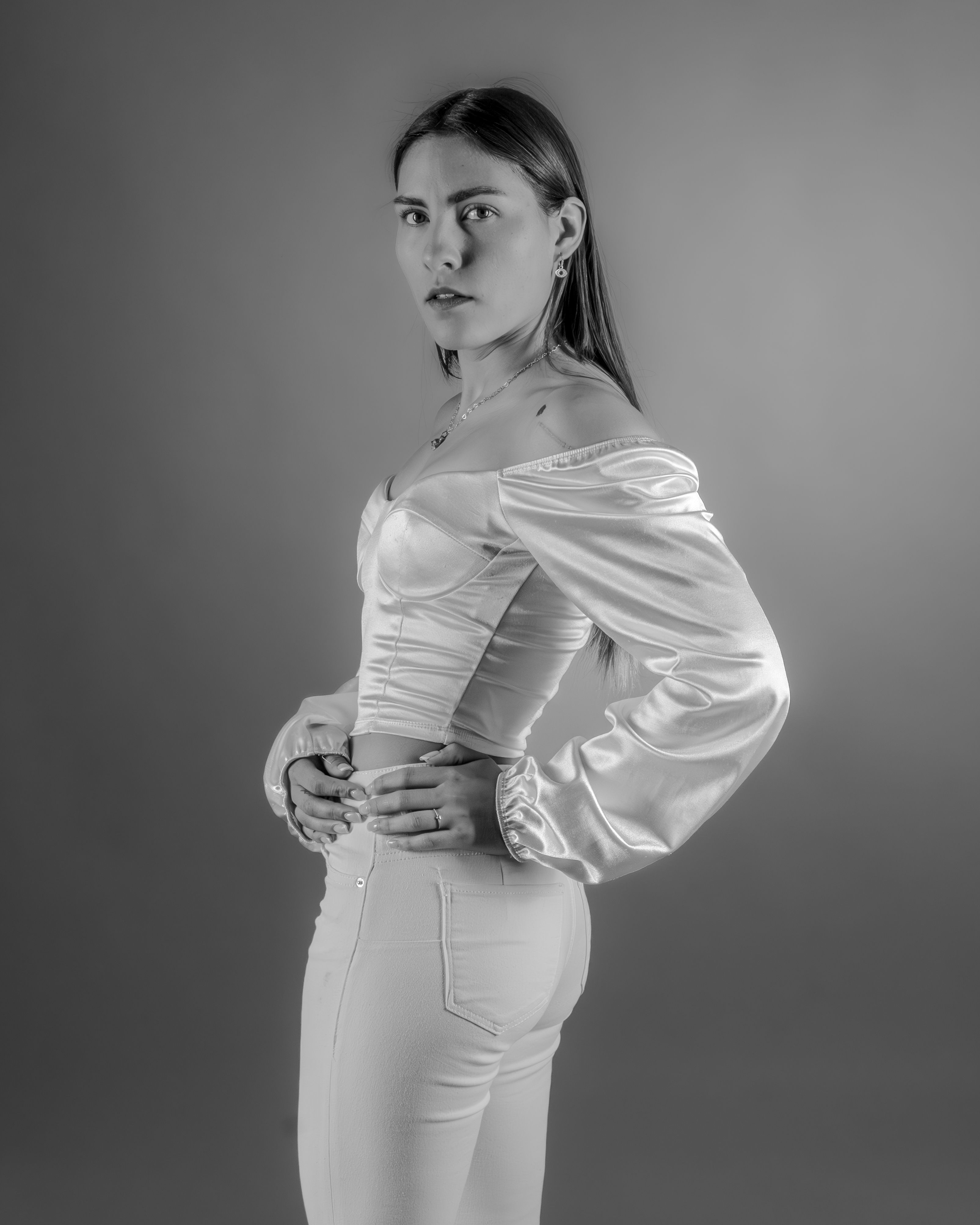 Elegant Woman Posing in Studio Black and White Portrait · Free Stock Photo